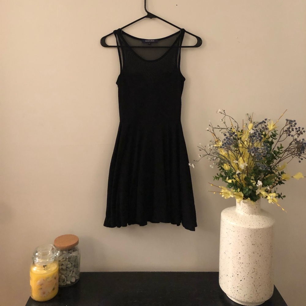 Black mesh pleated dress.